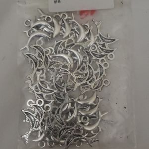 40 double silver dolphin charms